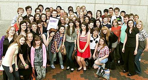 VICTORIOUS. . . . Oldham Youth Wind Band with its award
