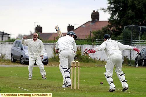 OLD ADVERSARIES . . . Royton’s vastly-experienced opening batsman Simon Brierley keeps veteran Oldham bowler Mel Whittle at bay at the Pollards yesterday. OLD ADVERSARIES . . . Royton’s vastly-experienced opening batsman Simon Brierley keeps veteran Oldham bowler Mel Whittle at bay at the Pollards yesterday.