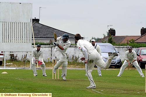 Joe Lovell, who went on to star with the ball, works Oldham’s Craig Joy off his hip during Royton’s innings. Joe Lovell, who went on to star with the ball, works Oldham’s Craig Joy off his hip during Royton’s innings.