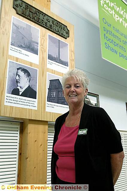 LOCAL history . . . Asda service manager Sue Backhouse with the display LOCAL history . . . Asda service manager Sue Backhouse with the display