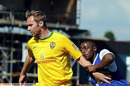 HOLD ON TIGHT... Djeny Bembo-Leta gets to grips with Notts County defender Liam Chilvers. 