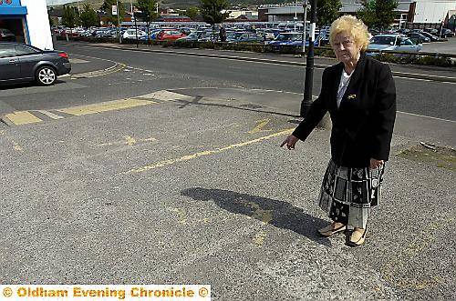 WORN away . . . Val Pemberton points out the vanishing disabled bay markings in Eastway car park WORN away . . . Val Pemberton points out the vanishing disabled bay markings in Eastway car park