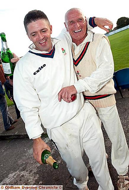 CHAMPAGNE MOMENT . . . . Mel Whittle and Oldham skipper Chris McDonnell celebrate.