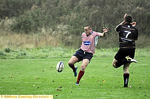 CENTRE Gavin Dodd attempts a kick for Oldham, who trounced Tarleton 50-0 at Manor Park. PICTURE: CHRIS SUNDERLAND CENTRE Gavin Dodd attempts a kick for Oldham, who trounced Tarleton 50-0 at Manor Park. PICTURE: CHRIS SUNDERLAND