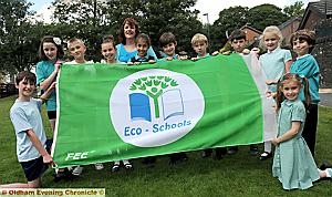 GOING green: pupils and eco co-ordinator Rebecca Keeley. 
