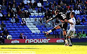 off target: Athletic striker Shefki Kuqi lets fly against Tranmere Rovers — but the effort flew wide. 