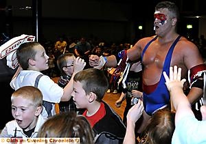 NUMBER ONE: Oldham-lad Clinton “Rocky” Steele is cheered by his fans. NUMBER ONE: Oldham-lad Clinton “Rocky” Steele is cheered by his fans.