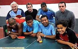 OLDHAM Table Tennis Club’s John Rutland (back, left), Gary Knowles, Junior Folashade, Dawid Sieradzki, head coach Dave Griffith (front, left), Bright Folashade, Paul Boyer and Abigail Griffith. OLDHAM Table Tennis Club’s John Rutland (back, left), Gary Knowles, Junior Folashade, Dawid Sieradzki, head coach Dave Griffith (front, left), Bright Folashade, Paul Boyer and Abigail Griffith.