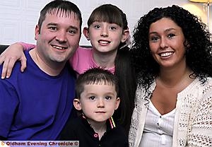 SO pleased: John Collinson and Rebecca Crossley with youngsters Courtney and Callum 