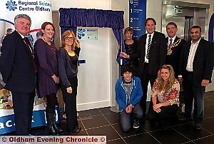 SO proud: (l-r Steve Lowe, chairman of governors; Jackie Gunn and Debbie Oates, daughters of former chairman of governors Gloria Oates; Jayne Clarke, principal; Nick Brown, guest of honour; Oldham Mayor, Councillor Richard Knowles and Councillor Shoab Akhtar. Kneeling: student Ben Nawaz and Youth Mayor Chantel Birtwistle
SO proud: (l-r Steve Lowe, chairman of governors; Jackie Gunn and Debbie Oates, daughters of former chairman of governors Gloria Oates; Jayne Clarke, principal; Nick Brown, guest of honour; Oldham Mayor, Councillor Richard Knowles and Councillor Shoab Akhtar. Kneeling: student Ben Nawaz and Youth Mayor Chantel Birtwistle