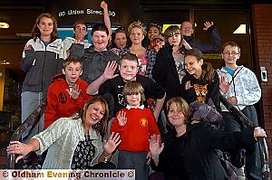 OLDHAM Young Carers, with workers Lindsey Parker (front left) and Mandie Whymark (front right), celebrating their Pride in Oldham nomination 
