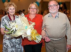 CARING nature... Glenys and Harold Cockcroft are presented with their award by Deputy Mayor, Councillor Olwen Chadderton, left. 
