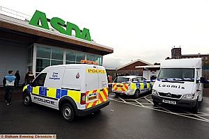 ON the scene . . . police arrive at Asda in Shaw
ON the scene . . . police arrive at Asda in Shaw