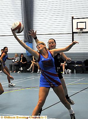 REACH OUT: Oldham’s Krista Enziano attempts to gain possession. REACH OUT: Oldham’s Krista Enziano attempts to gain possession.