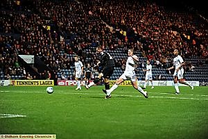 FIGHTBACK UNDER WAY; Striker Shefki Kuqi puts Athletic back in the game with a side-foot finish following Preston’s quickfire double. 