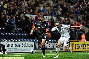 RUNNING GAME: Athletic midfielder Tom Adeyemi surges forward. 