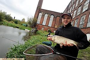 NET-BUSTER: Andrew Mitchell shows off a fish at Chadderton Mill Lodge. 
