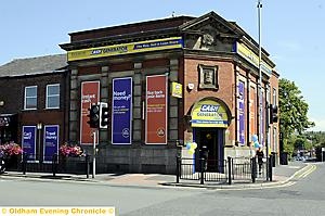 CONTROVERSY GENERATOR: THE blue and red window signs and large yellow sign over the door have been disallowed by the council, though the remaining yellow signs have been approved. CONTROVERSY GENERATOR: THE blue and red window signs and large yellow sign over the door have been disallowed by the council, though the remaining yellow signs have been approved.