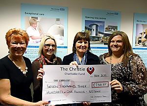 Presentation of £7000 to Christies from Family of Chris Frankland L to R Jacky Plant, Kayie Frankland, Angela Frankland, Andrea Wiliams