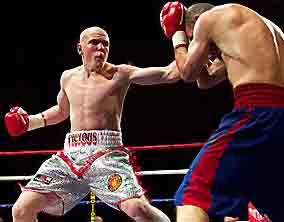 STILL UNBEATEN: Kieran Farrell (left) on the front foot against Youseff Al Hamidi.