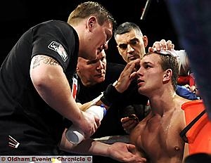 ON THE OTHER SIDE: Blackpool welterwight Adam Little listens to Ricky Hatton inbetween rounds at the Oldham Sports Centre. 