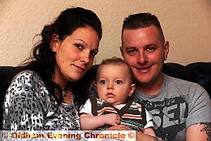Cason Wright with his mum and dad Micelle Plevin and Craig Wright. 
