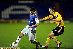PUSH COMES TO SHOVE: Athletic’s Tomos Jones is pressured in last night’s FA Youth Cup tie. PUSH COMES TO SHOVE: Athletic’s Tomos Jones is pressured in last night’s FA Youth Cup tie.