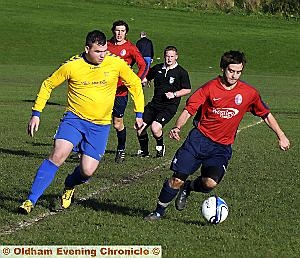 Puckersley's Anthony Diffy evades Highfields Martin Gird Puckersley's Anthony Diffy evades Highfields Martin Gird