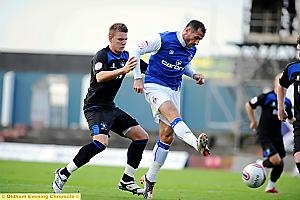 Shefki Kuqi shoots at goal 