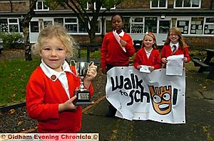Artwork competition at St. Anne's School, Royton supprting International Walk to School Month. Left to right, Edith Smith (4) overall winner, runners-up Cyrhas Marshall, Kiera Preston, Grace Holland. 
