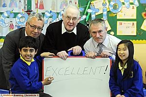 Excellent OFSTED for Oldham Children's Services. Taken at St Luke's Primary School, Chadderton. (back) L-R: Michael Jameson (OMBC Director of Children's Services), Cllr Hugh MacDonald (Cabinet Member), Ian Walsh (St Luke's Headteacher). 
Pupils L-R: Uneeb Mohammed, Hannah Trelfa and Annie Yip.