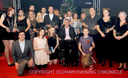 WINNERS ALL . . . the 11 category winners proudly show off their trophies at the finale of a memorable Pride in Oldham Awards 2011