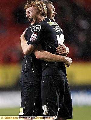 WELL DONE, MATE: Chris Taylor celebrates the draw at Charlton with Zander Diamond. WELL DONE, MATE: Chris Taylor celebrates the draw at Charlton with Zander Diamond.