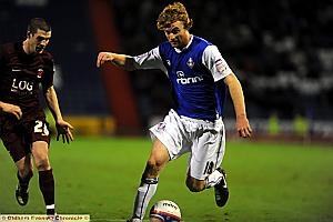 CHRIS Taylor - in action against Hartlepool on Boxing Day - has hailed Athetic's team spirit CHRIS Taylor - in action against Hartlepool on Boxing Day - has hailed Athetic's team spirit