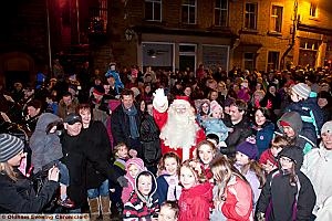 Santa with the crowds at the Delph switch-on  

