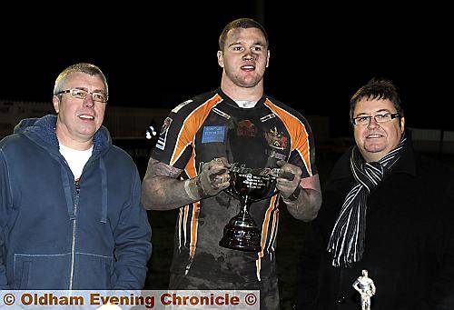 MAN OF THE MATCH: Ben Wood, pictured with Steve Brown (left) and Chris Hamilton (right), picks up the Heritage Trust Trophy after scoring a hat-trick.
