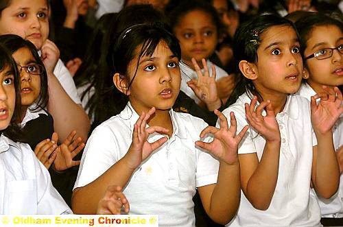 SIGNING and singing, pupils hope they are record-breakers 