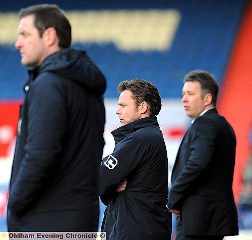 MAN IN THE MIDDLE . . . Athletic manager Paul Dickov is flanked by his assistant Gerry Taggart (left) and Peterborough United boss Darren Ferguson. MAN IN THE MIDDLE . . . Athletic manager Paul Dickov is flanked by his assistant Gerry Taggart (left) and Peterborough United boss Darren Ferguson.