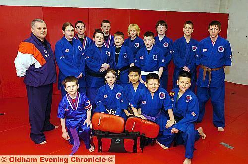 GOING FOR GOLD . . . Instructor Dave Terry (left) is pictured with the 15 DEMAA students heading to the WOMAA Games in Cardiff.
GOING FOR GOLD . . . Instructor Dave Terry (left) is pictured with the 15 DEMAA students heading to the WOMAA Games in Cardiff.