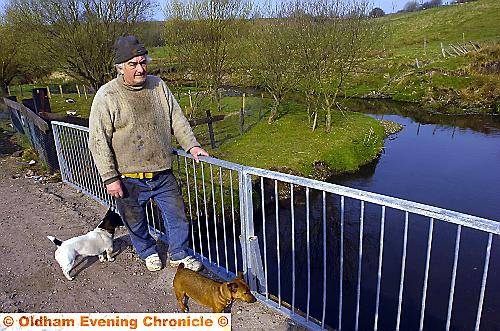 FARMER Ben Lancaster at the polluted River Irk. FARMER Ben Lancaster at the polluted River Irk.