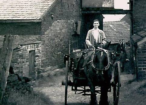 OLD DAYS... John on his milk round  

