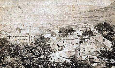 A virtually unrecognisable Dobcross shows the Huddersfield Canal 
