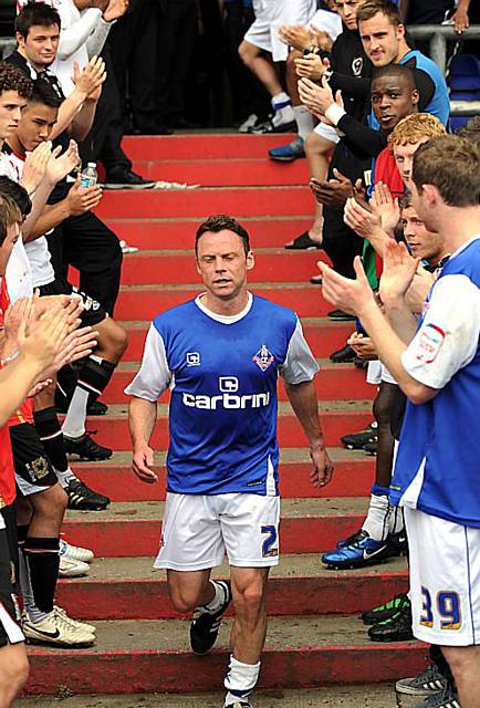 SIGNING OFF . . . Athletic players form a guard of honour for manager Paul Dickov after he appeared in his last game as a professional footballer.
SIGNING OFF . . . Athletic players form a guard of honour for manager Paul Dickov after he appeared in his last game as a professional footballer.