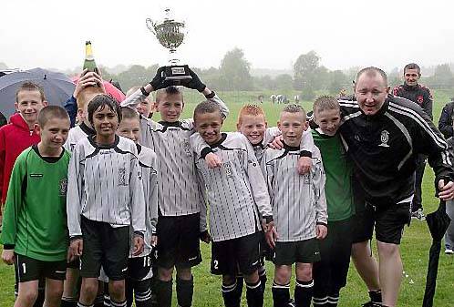FAILSWORTH West under-11s: wet but winners!
FAILSWORTH West under-11s: wet but winners!