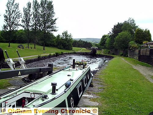 STUCK... the narrow boat was left stuck in a muddy bog after the canal quickly drained. STUCK... the narrow boat was left stuck in a muddy bog after the canal quickly drained.
