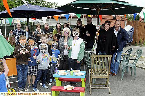 Sandra Whelan ( centre ) with her neighbours and friends at her home in Middleton Road, Chadderton for the Big Lunch Event
Sandra Whelan ( centre ) with her neighbours and friends at her home in Middleton Road, Chadderton for the Big Lunch Event