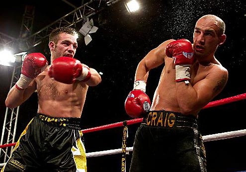 TAKE THAT . . . Lee Purdy catches Oldham challenger Craig Watson with a stinging left hand in the British welterweight showdown at Oldham Sports Centre. TAKE THAT . . . Lee Purdy catches Oldham challenger Craig Watson with a stinging left hand in the British welterweight showdown at Oldham Sports Centre.