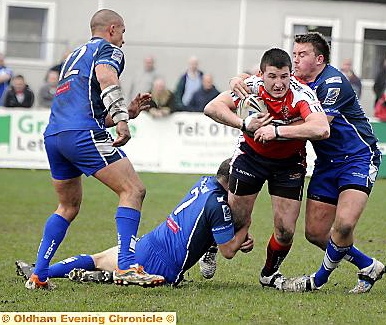 LIAM Gilchrist... the Oldham prop (centre) is back from Australia and raring to go. LIAM Gilchrist... the Oldham prop (centre) is back from Australia and raring to go.