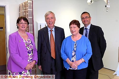 OFFICIAL visit . . . Shauna Dixon, chief executive of NHS Oldham, left, with health minister Lord Howe, patient Jacqueline Buckley and Dr Alan Nye OFFICIAL visit . . . Shauna Dixon, chief executive of NHS Oldham, left, with health minister Lord Howe, patient Jacqueline Buckley and Dr Alan Nye