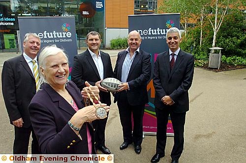 Pictured at the Gallery Oldham event are (from the left) One Future Project Steering group chairman Jeremy Broadbent, 1960 Olympic high jump silver medalist Dorothy Shirley-Emerson with her medal, former Oldham Rugby players Barrie McDermott and Terry Flanagan and steering group vice-chairman John Townsend.
Pictured at the Gallery Oldham event are (from the left) One Future Project Steering group chairman Jeremy Broadbent, 1960 Olympic high jump silver medalist Dorothy Shirley-Emerson with her medal, former Oldham Rugby players Barrie McDermott and Terry Flanagan and steering group vice-chairman John Townsend.